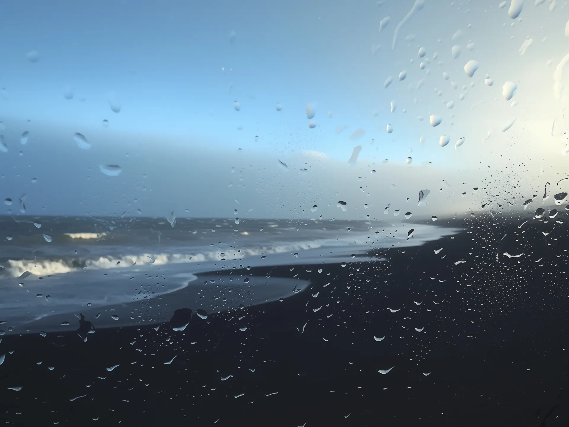 Rainy Ocean Through a Window Wallpaper