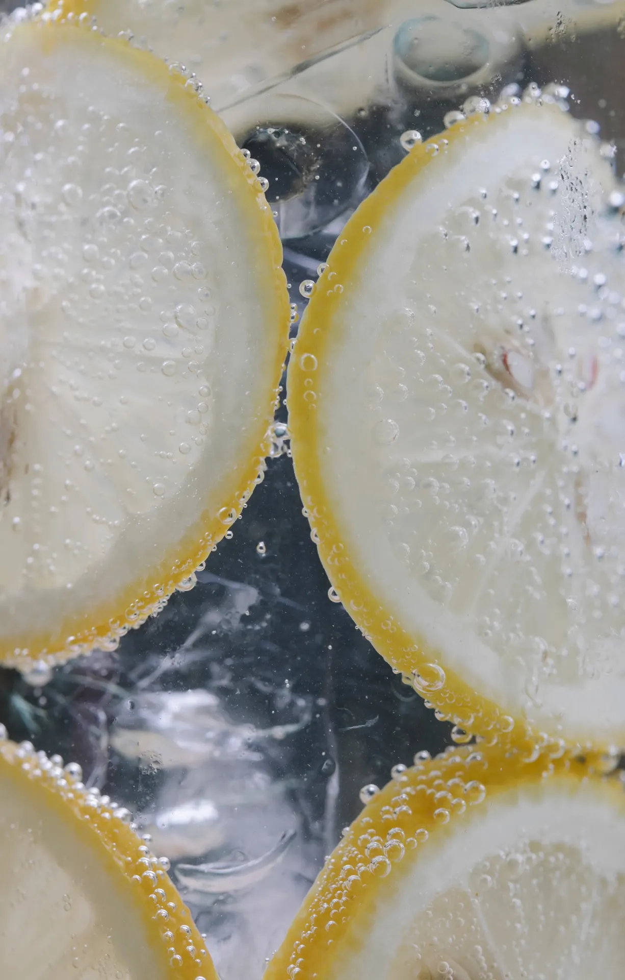 Sparkling Lemon Slices and Bubbles Macro Wallpaper